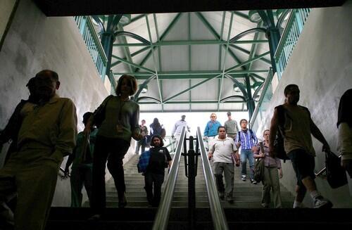 Commuters exit the Gold Line track at Union Station this month.