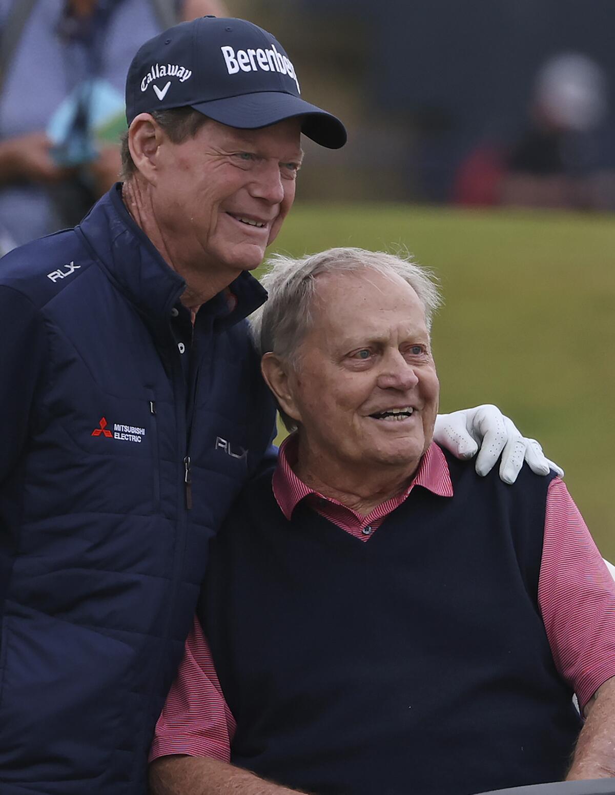 Golf legends Jack Nicklaus, right, and Tom Watson of United States pose for a photo during a 'Champions round' as preparations continue for the British Open golf championship on the Old Course at St. Andrews, Scotland, Monday July 11, 2022. The Open Championship returns to the home of golf on July 14-17, 2022, to celebrate the 150th edition of the sport's oldest championship, which dates to 1860 and was first played at St. Andrews in 1873. (AP Photo/Peter Morrison)