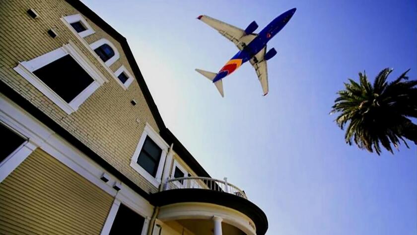 Many La Jollans say changes in flight paths have casued increases in airplane noise in several La Jolla neighborhoods. Pictured is a Southwest Airlines 737 passing over Bankers Hill en route to San Diego International Airport.