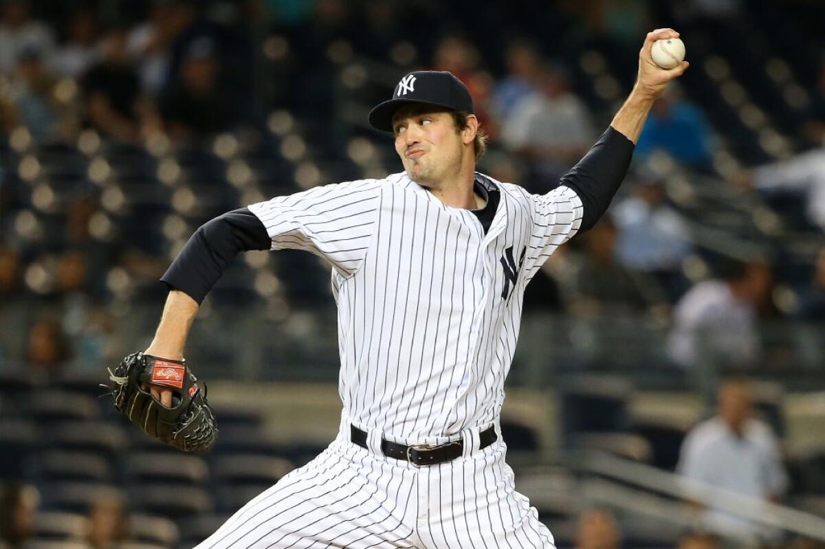 New York Yankees pitcher Andrew Miller throws during the ninth inning of a game against the Washington Nationals on June 9.