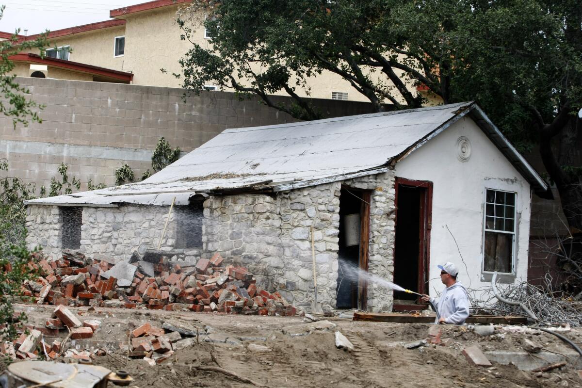 A small rock cottage at the back of a property at 2811 Manhattan in Glendale was set to be demolished on Tuesday, May 6, 2014.