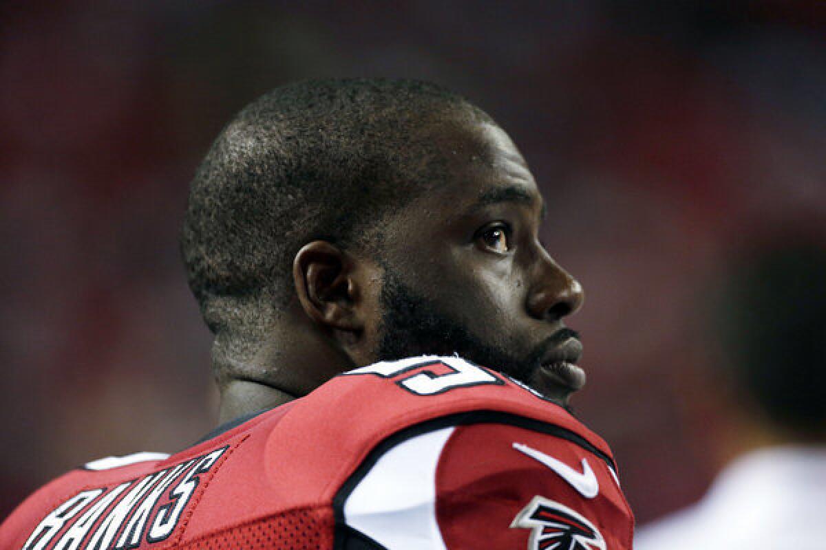 Atlanta Falcons linebacker Brian Banks (53) sits on the bench during the second half of a preseason NFL football game against the Jacksonville Jaguars in Atlanta. Banks announced Friday that he was no longer on the team.