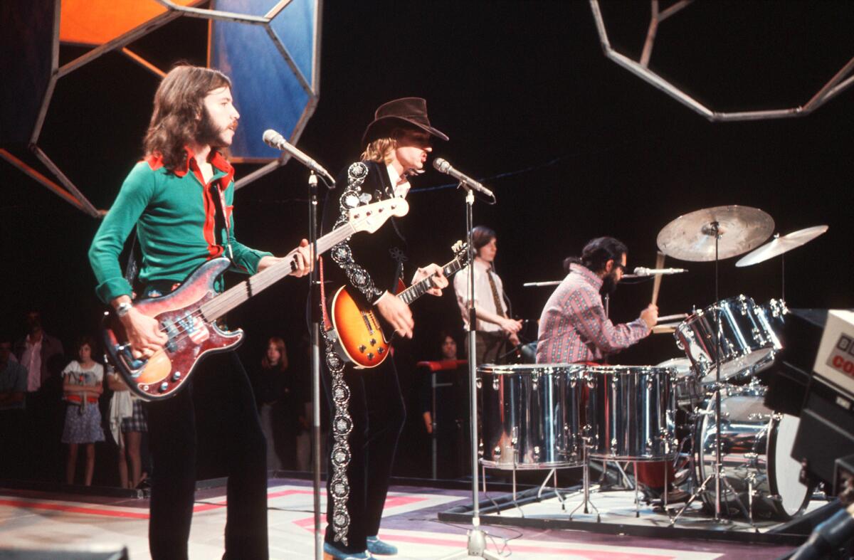 The James Gang -- Dale Peters, from left, Joe Walsh and Jimmy Fox -- performs in 1971.