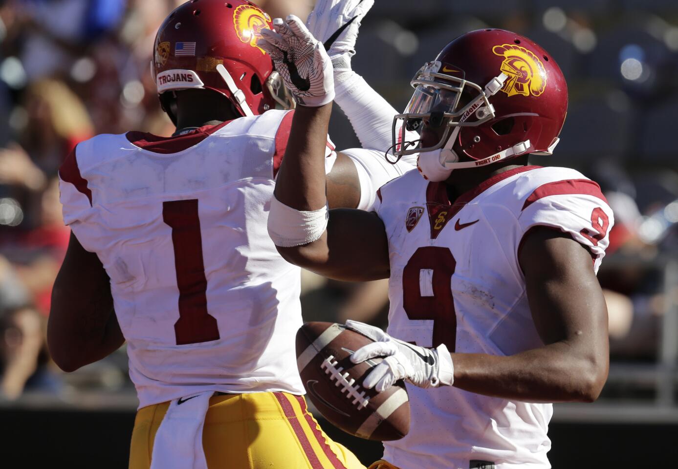 USC receiver JuJu Smith-Schuster (9) celebrates with Darreus Rogers after scoring a touchdown against Arizona during the second half of a game on Oct. 15.