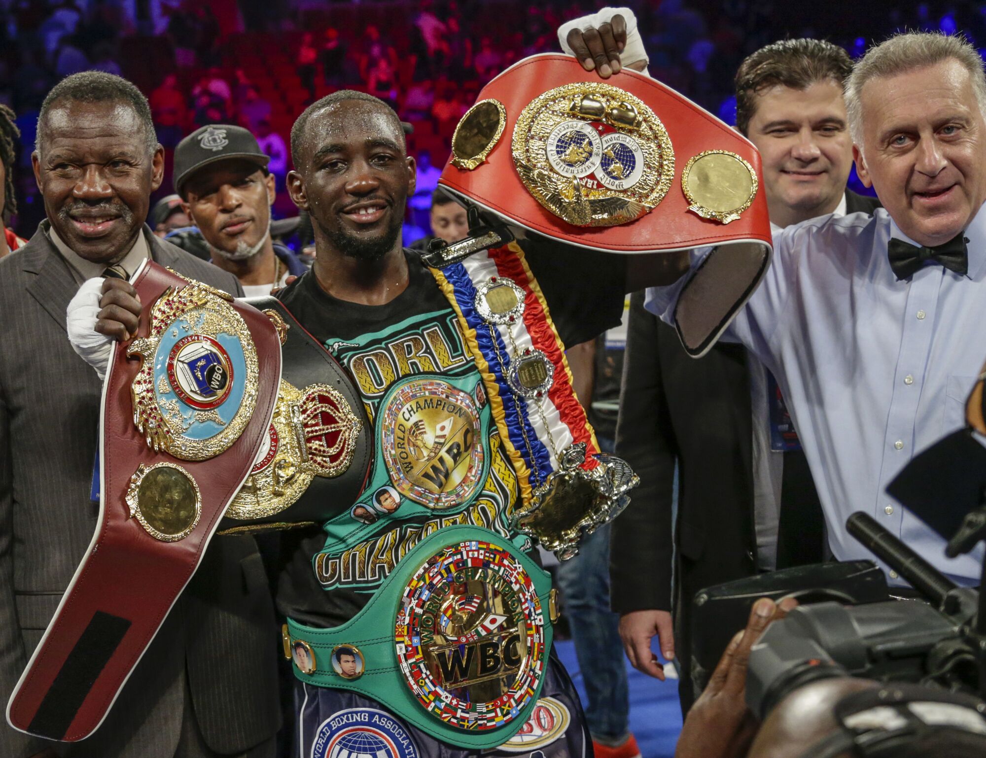 Terence "Bud" Crawford poses with his four title belts after beating Julius Indongo on Aug. 19, 2017. 