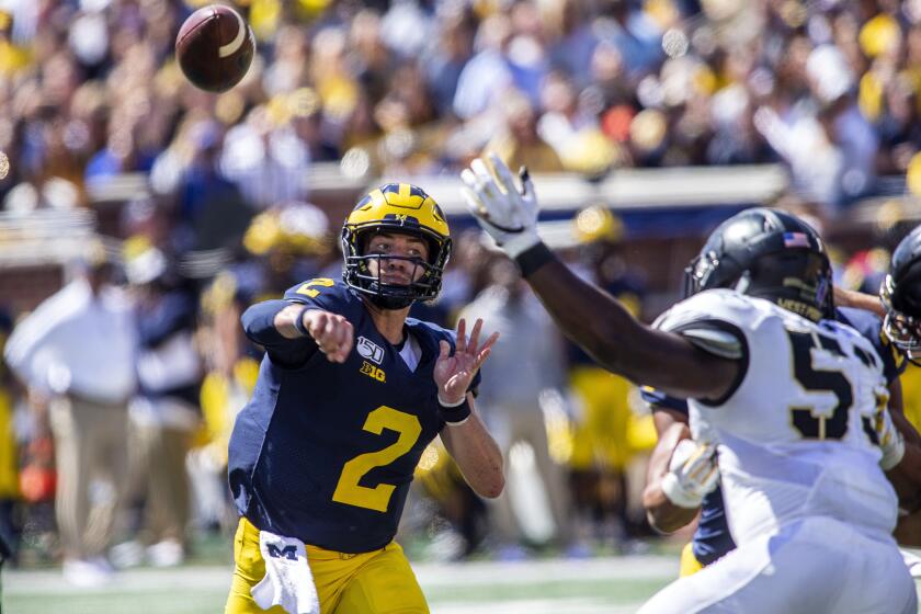Michigan quarterback Shea Patterson (2) throws a pass in the second quarter of an NCAA football game against Army in Ann Arbor, Mich., Saturday, Sept. 7, 2019. (AP Photo/Tony Ding)