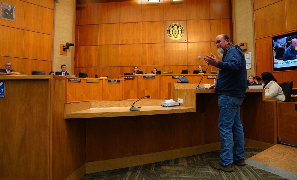 Homeless advocate Michael McConnell speaks against a proposed San Diego ordinance that would ban encampments on public land.