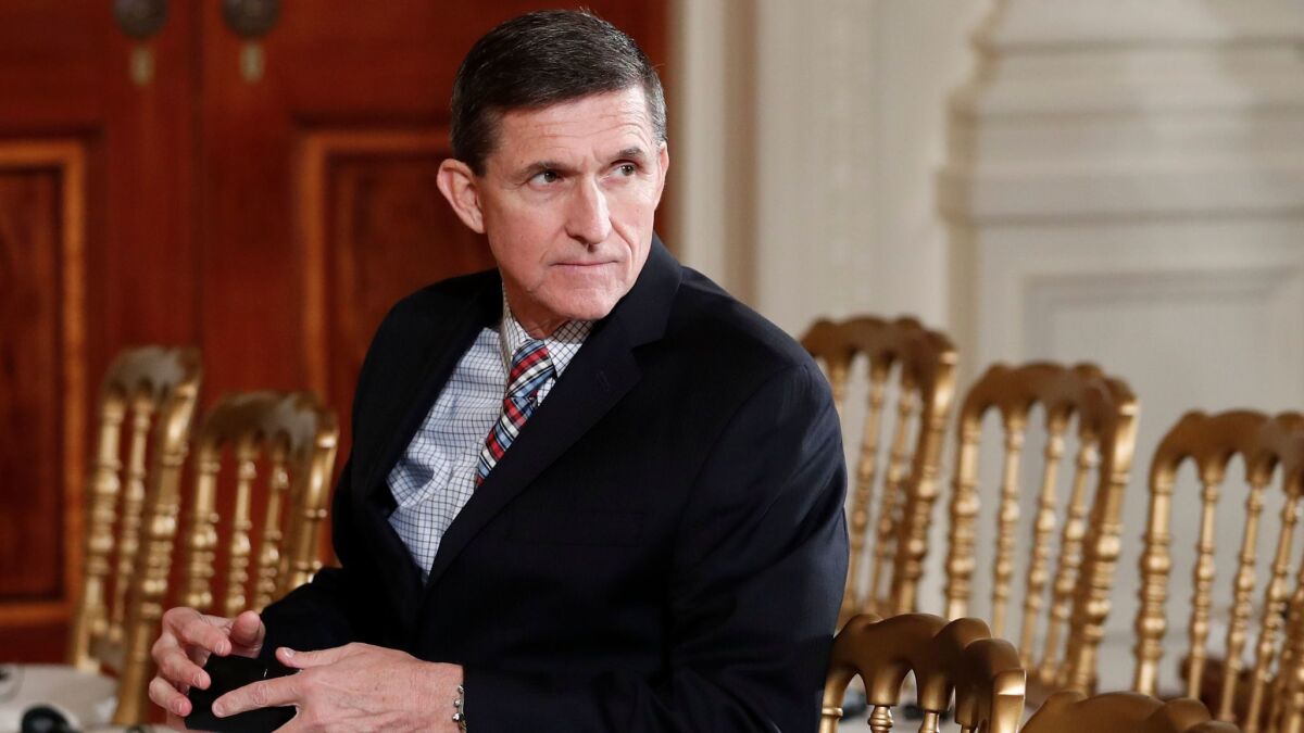 In this Feb. 10 file photo, then-National Security Adviser Michael Flynn sits in the East Room of the White House in Washington.