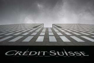 FILE - Grey clouds cover the sky over a building of the Credit Suisse bank in Zurich, Switzerland, on Feb. 21, 2022. Battered shares of Credit Suisse lost more than one-quarter of their value Wednesday March 15, 2023, hitting a record low after its biggest shareholder — the Saudi National Bank — told outlets that it would not inject more money into the ailing Swiss bank. (Ennio Leanza/Keystone via AP, File)