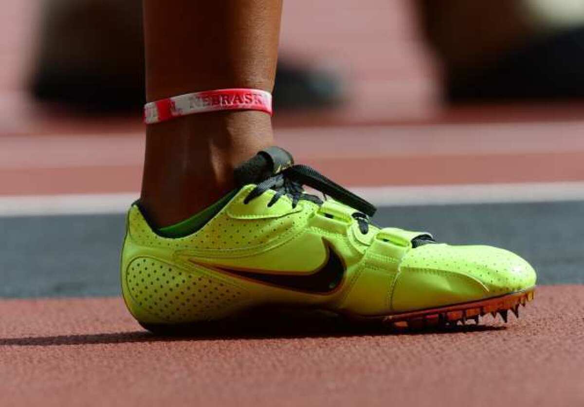 The neon Nike shoe of U.S. 100-meters hurdler Chantae McMillan.