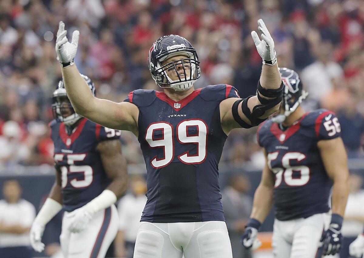 Texans defensive lineman J.J. Watt pumps up the crowd while playing against the Tampa Bay Buccaneers in Houston on Sept. 27.