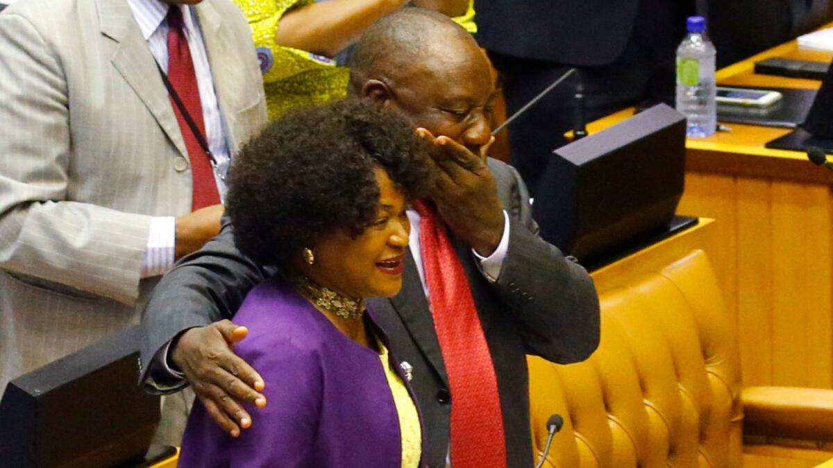 Cyril Ramaphosa hugs South African National Assembly Speaker Baleka Mbete before his swearing-in as South Africa's president on Feb. 15.