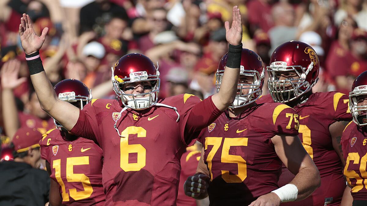 USC quarterback Cody Kessler celebrates after throwing a touchdown during a win over Colorado on Oct. 18, 2014.