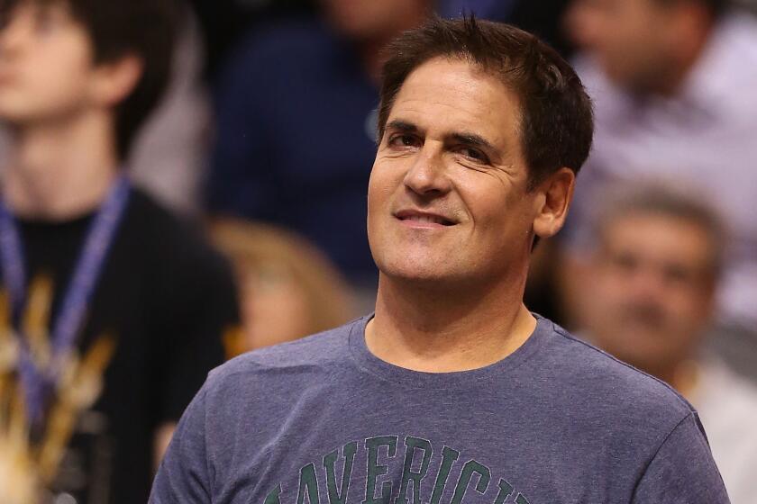 Dallas Mavericks owner Mark Cuban attends a game against the Phoenix Suns in January 2014.