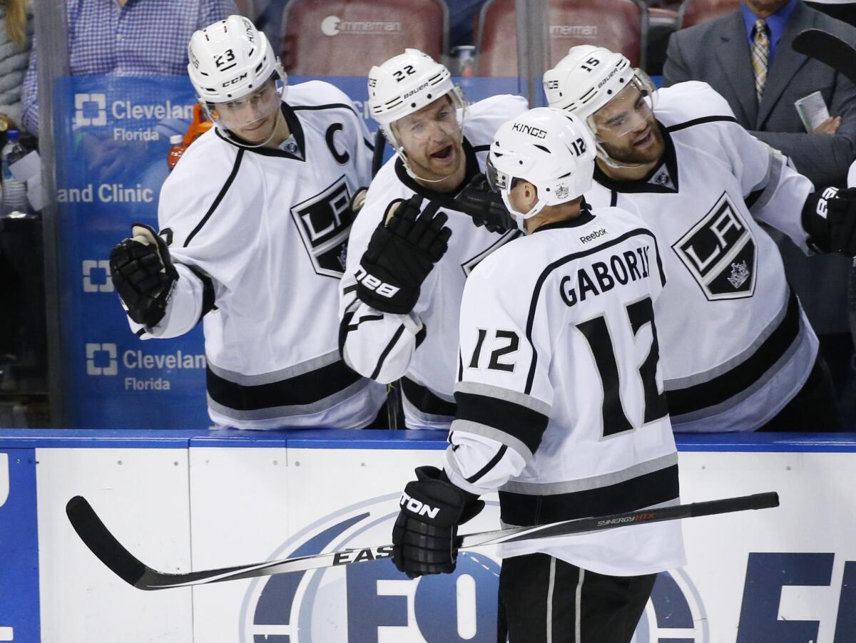 Kings right wing Marian Gaborik is congratulated by teammates after scoring during the third period.