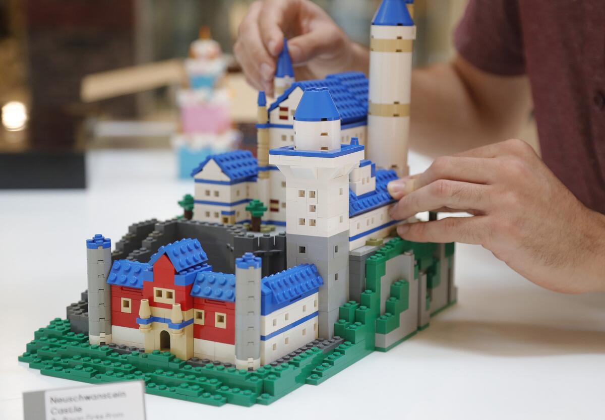 Lego master Bryan Firks with his castle build "Neuschwanstein Castle."