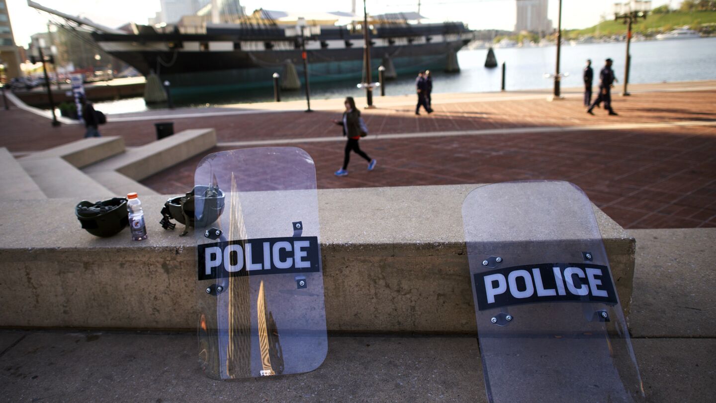 Riot police shields lay on a concrete bench in Baltimore's Inner Harbor area on April 29.