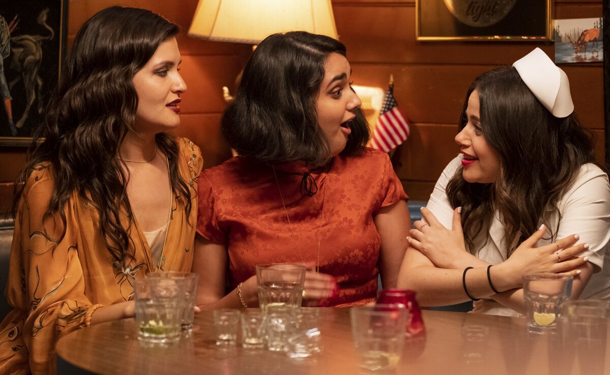 This image released by Sony -TriStar Pictures shows Phillipa Soo, from left, Geraldine Viswanathan and Molly Gordon in a scene from "The Broken Hearts Gallery." (George Kraychyk/Sony-TriStar Pictures via AP)