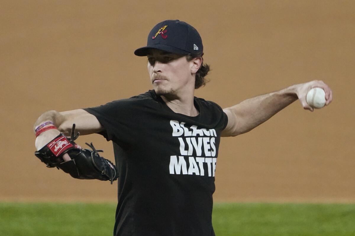 Atlanta Braves pitcher Max Fried throws during a workout at Globe Life Field.