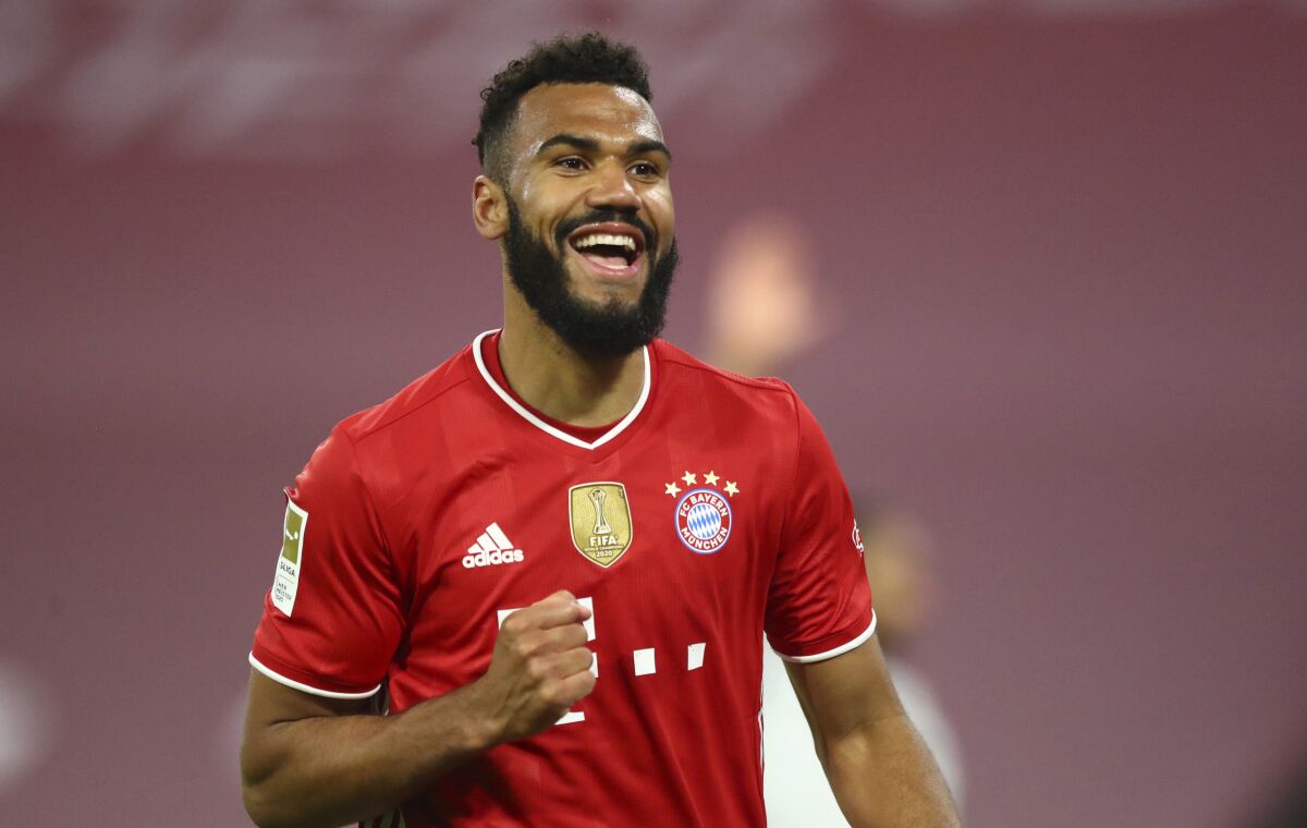 FILE - In this Tuesday, April 20, 2021 file photo, Bayern's Eric Maxim Choupo-Moting celebrates a goal that was disallowed for offside during the German Bundesliga soccer match between Bayern Munich and Bayer Leverkusen at the Allianz Arena stadium in Munich, Germany. Choupo-Moting has signed a two-year contract extension. That cements his status as the backup to Robert Lewandowski. Choupo-Moting joined Bayern in October on a free transfer for one season after his contract with Paris Saint-Germain expired. (AP Photo/Matthias Schrader, Pool, File)