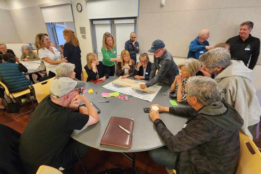 Laguna Beach community members worked in groups to discuss potential improvements for Laguna Canyon Road in a workshop meeting on Tuesday.