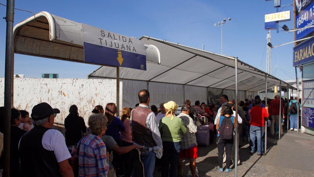 Pedestrians line up in Tijuana to enter the United States through the San Ysidro Port of Entry on November 9, 2016.