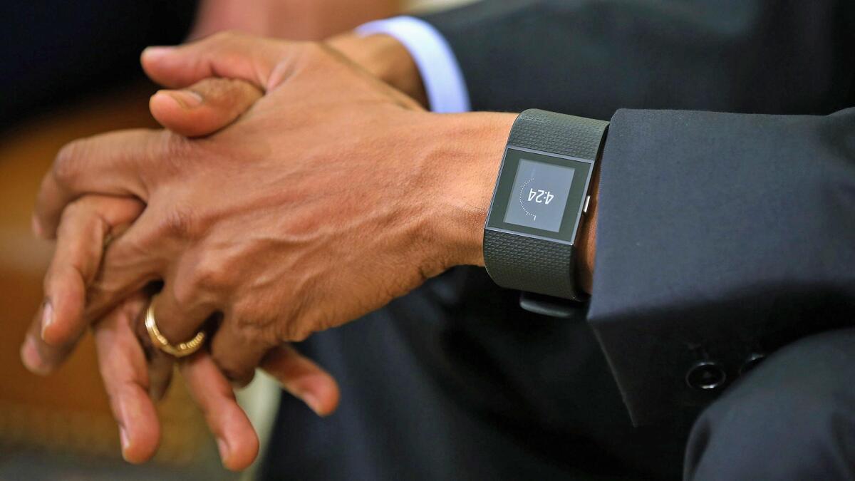 The 44th president wore a Fitbit.