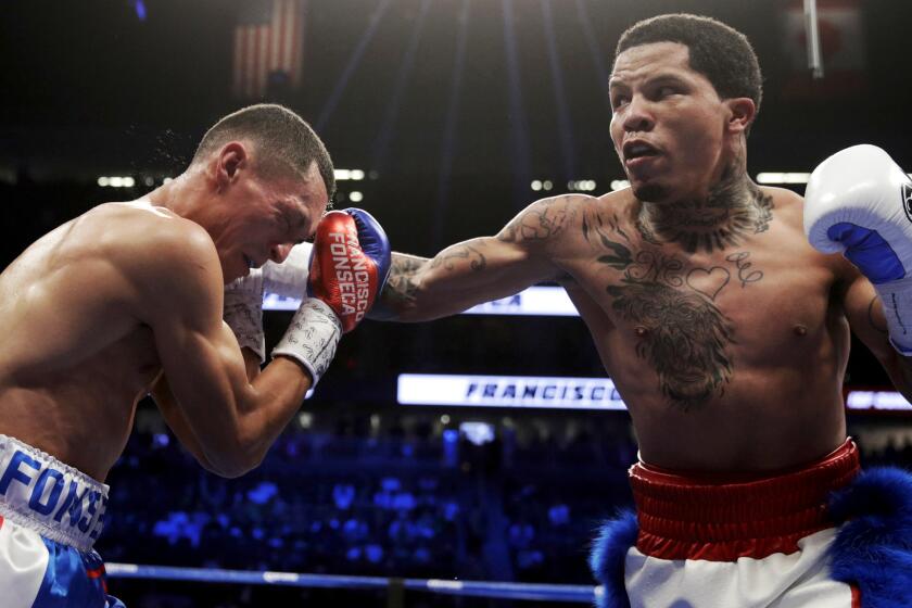 Gervonta Davis hits Francisco Fonseca, of Costa Rica, in a boxing match Saturday, Aug. 26, 2017, in Las Vegas. (AP Photo/Isaac Brekken)