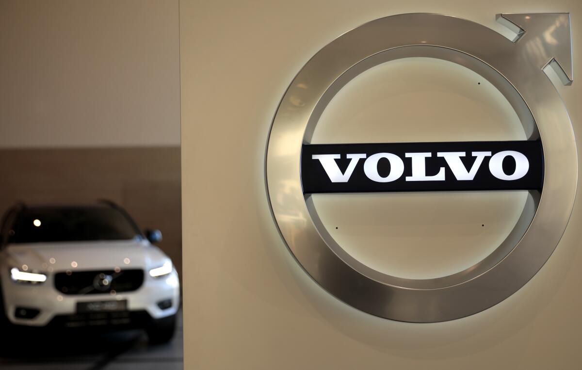 Volvo car and Volvo logo