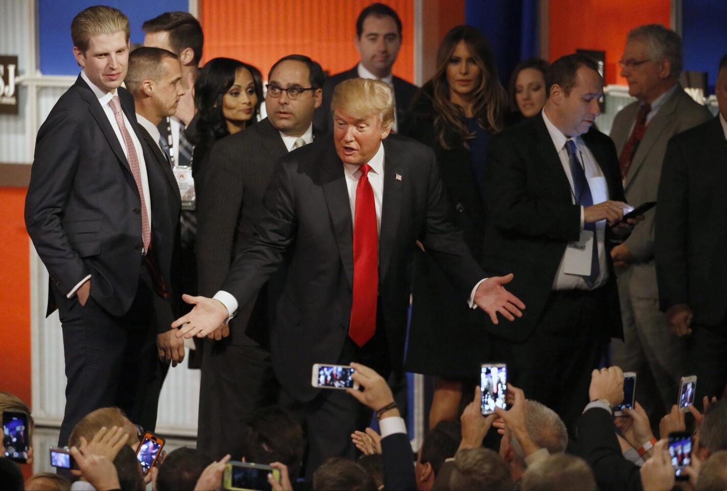 Donald Trump talks to supporters after the Republican presidential debate at the Milwaukee Theatre.