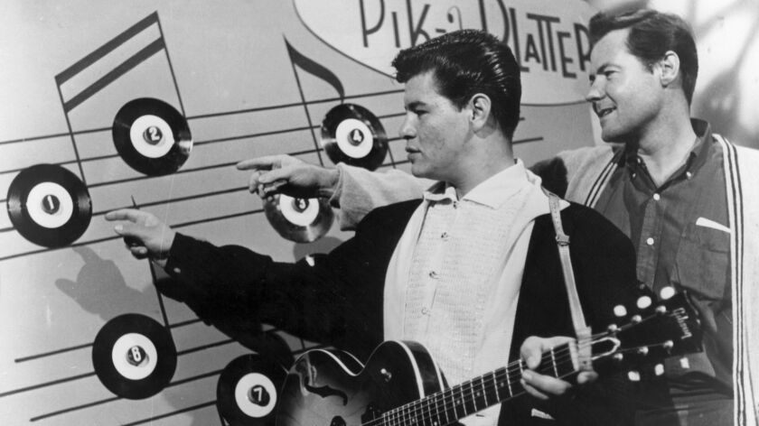 Rock musician Ritchie Valens, left, shown in 1958 with manager and Del-Fi records label owner Bob Keane, is among artists whose recordings have been selected for the Library of Congress' National Recording Registry.
