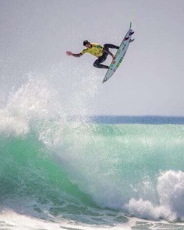 World Surf League champion Gabriel Medina of Brazil soars high on a big wave at Lower Trestles on Sept. 14, 2021.