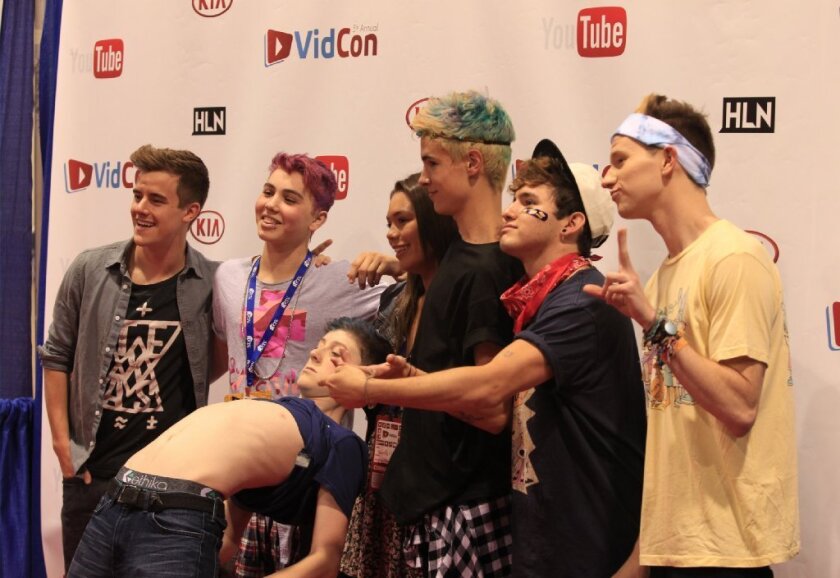 Connor Franta, left, poses with other YouTube actors at the VidCon convention in Anaheim in June 2014.