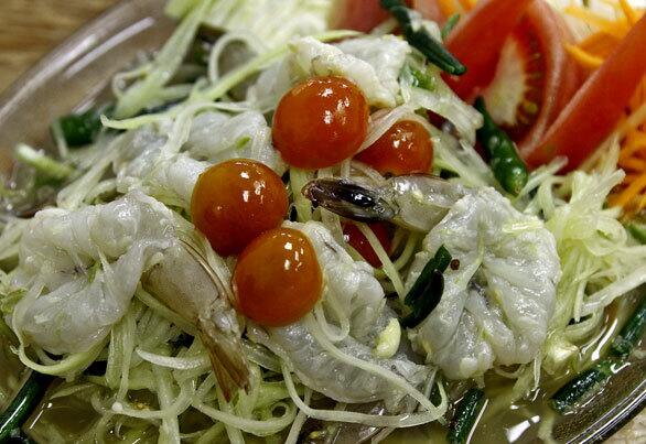 A favorite at the Thai Town restaurant is its version of som tam, green papaya salad. It is full of searing sours and fermented fish flavors. You can also order it with raw shrimp.