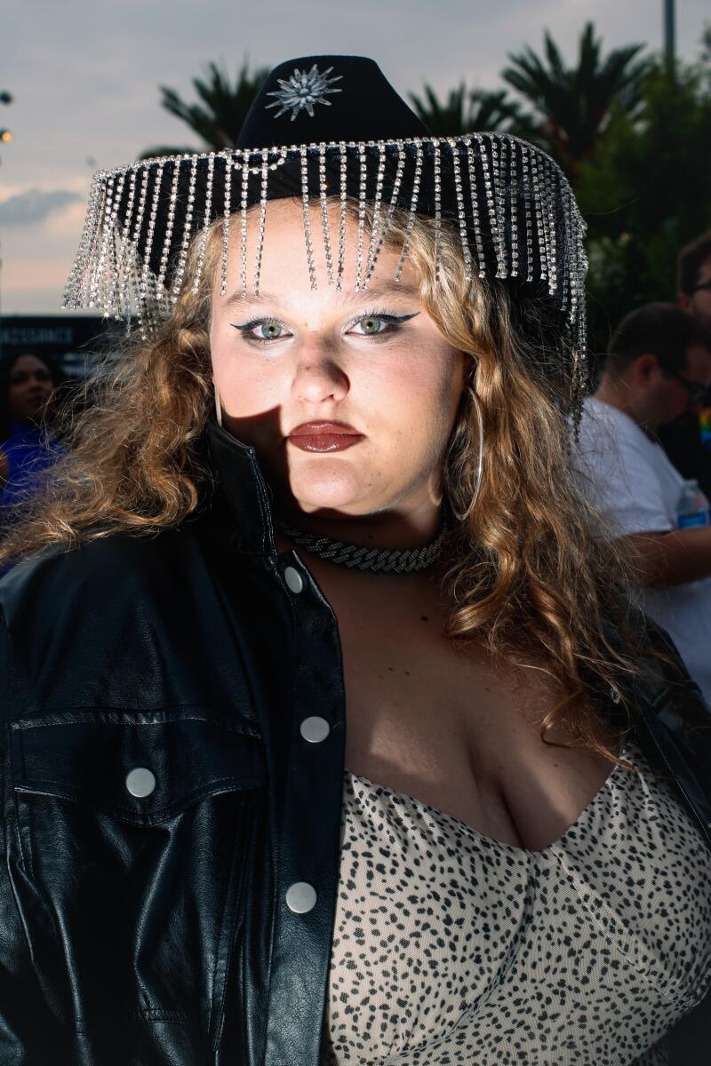 A woman poses for a portrait