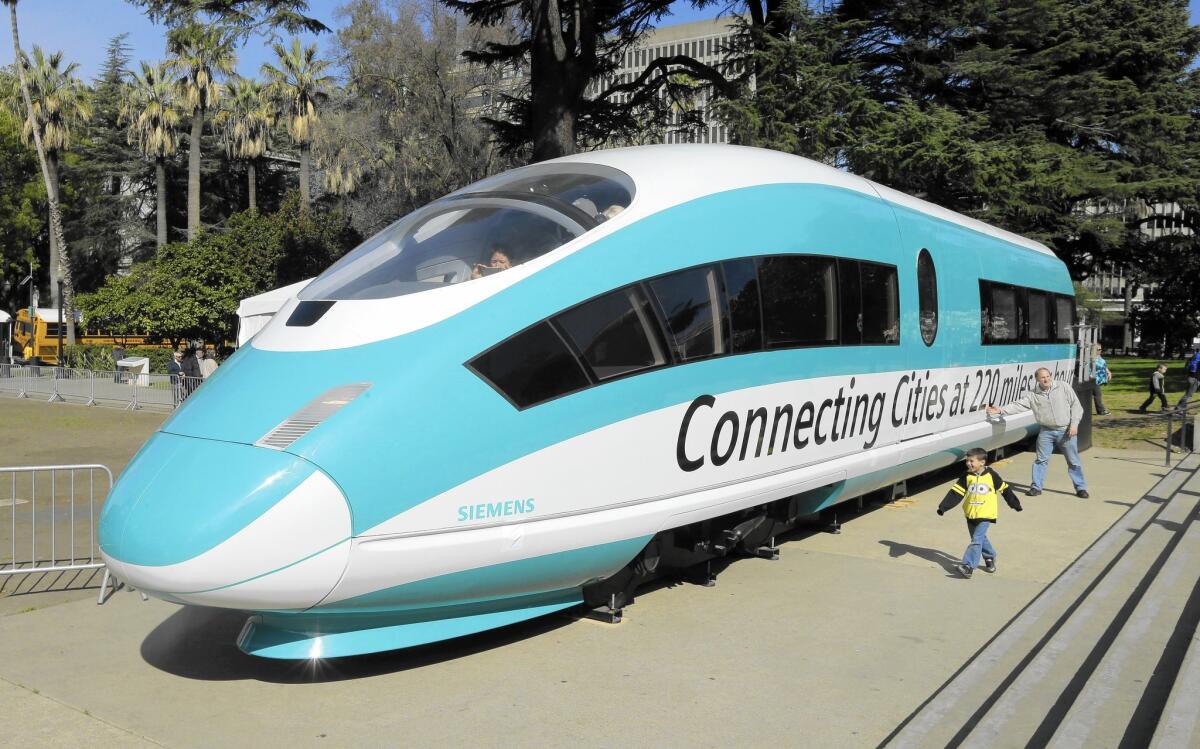 A full-scale mock-up of a high-speed train is displayed at the Capitol in Sacramento. Officials are confident they could navigate any pitfalls in the bullet train project.