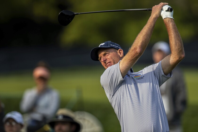 Jim Furyk tees off on the first hole during the second round of the U.S. Senior Open Championship at Omaha Country Club on Friday, July 9, 2021, Omaha, Neb. (Chris Machian/Omaha World-Herald via AP)