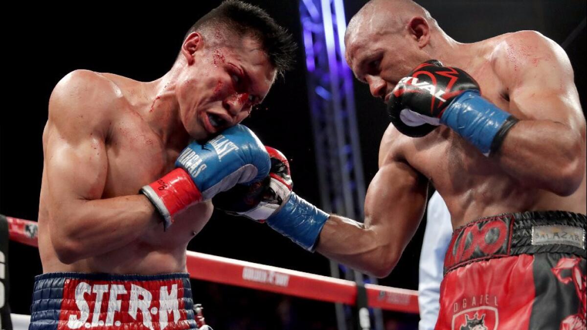 Orlando Salido hits Francisco Vargas, left, with a right hand during their WBC super-featherweight title bout on June 4.