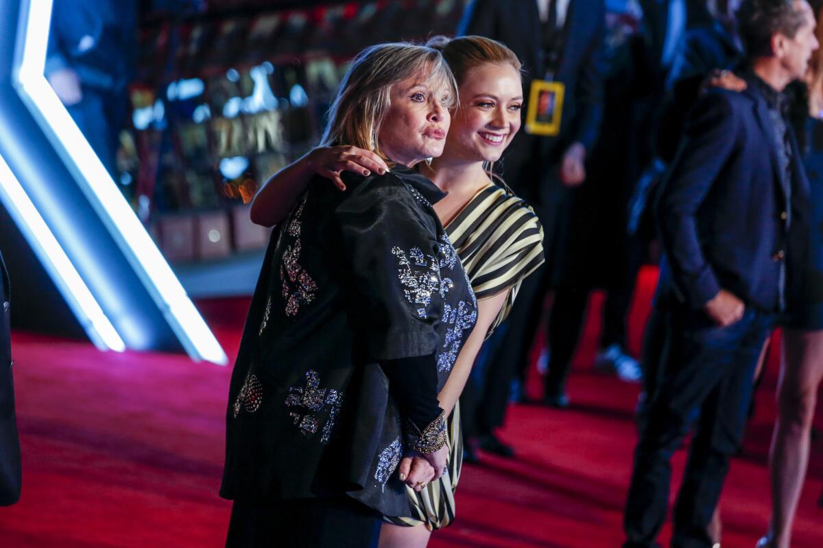 Carrie Fisher and her daughter, Billie Lourd, attended the premiere of 2015's "Star Wars: The Force Awakens" together in Hollywood. Lourd acts in the final three movies of the nine-part saga.