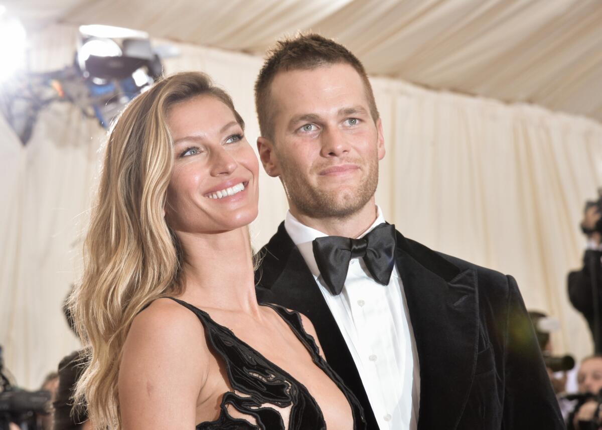 Gisele Bundchen and Tom Brady attend a New York event in May 2014.