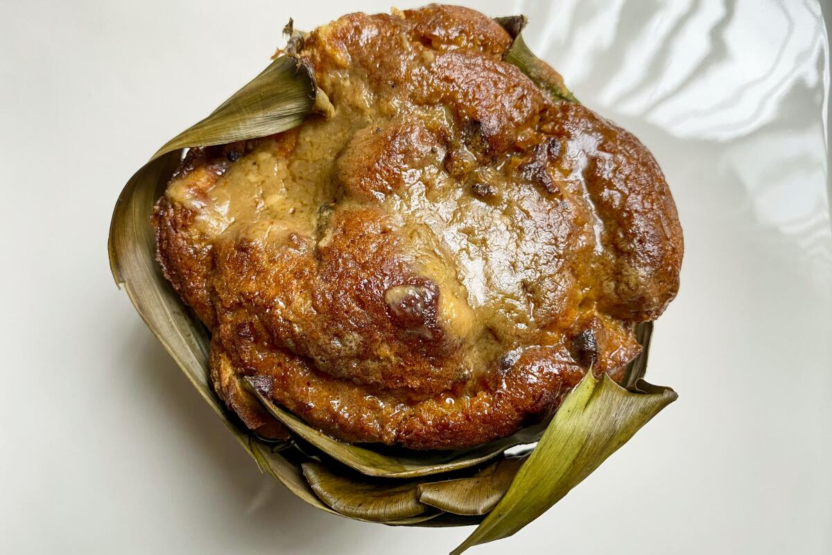 Kuya Lord's bibingka mamon is wrapped in banana leaves.