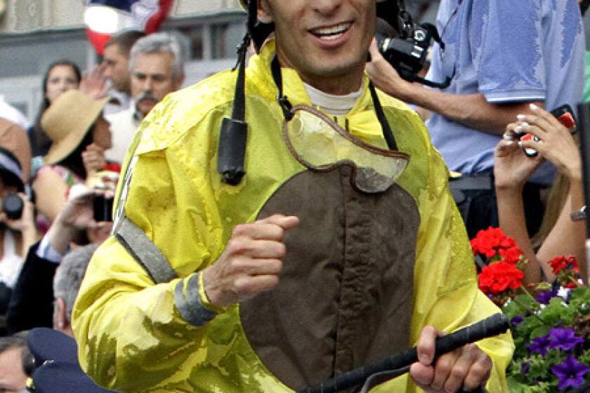 John Velazquez celebrates after riding Union Rags to victory in the Belmont Stakes last year.