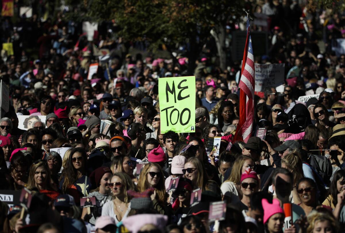 Protesters gather at Grand Park in Los Angeles for a women's march against sexual violence on Jan. 20, 2018. More than 140 women signed a letter calling out sexual harassment in California politics, sparking a #MeToo movement at the state Capitol last fall.