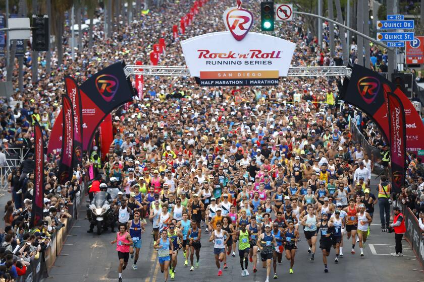 Runners start the Rock 'n' Roll Running Series Marathon and Half Marathon.