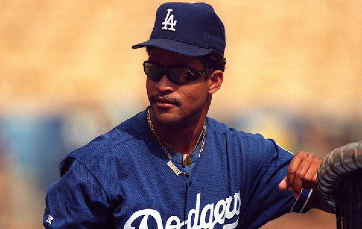 Former Dodgers right fielder Raul Mondesi, the 1994 National League rookie of the year, says the Dodgers have to give Yasiel Puig time to develop.