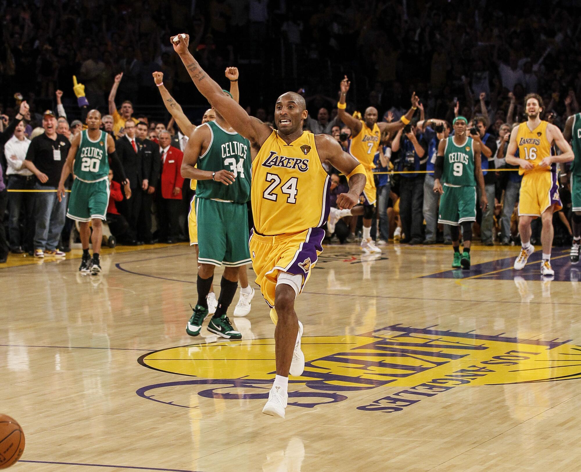 Kobe Bryant begins the celebration as the Lakers beat the Celtics for the NBA Championship at Staples Center.