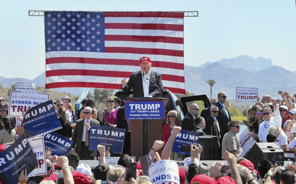 Donald Trump speaks to an Arizona rally.