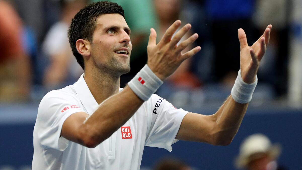 Novak Djokovic reacts after defeating Gael Monfils in a U.S. Open semifinal on Friday.