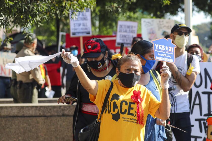 LOS ANGELES, CA - SEPTEMBER 02: A broad coalition of tenants and housing rights organizers rally at Stanley Mosk Courthouse to protest eviction orders issued against renters Stanley Mosk Courthouse on Wednesday, Sept. 2, 2020 in Los Angeles, CA. (Irfan Khan / Los Angeles Times)