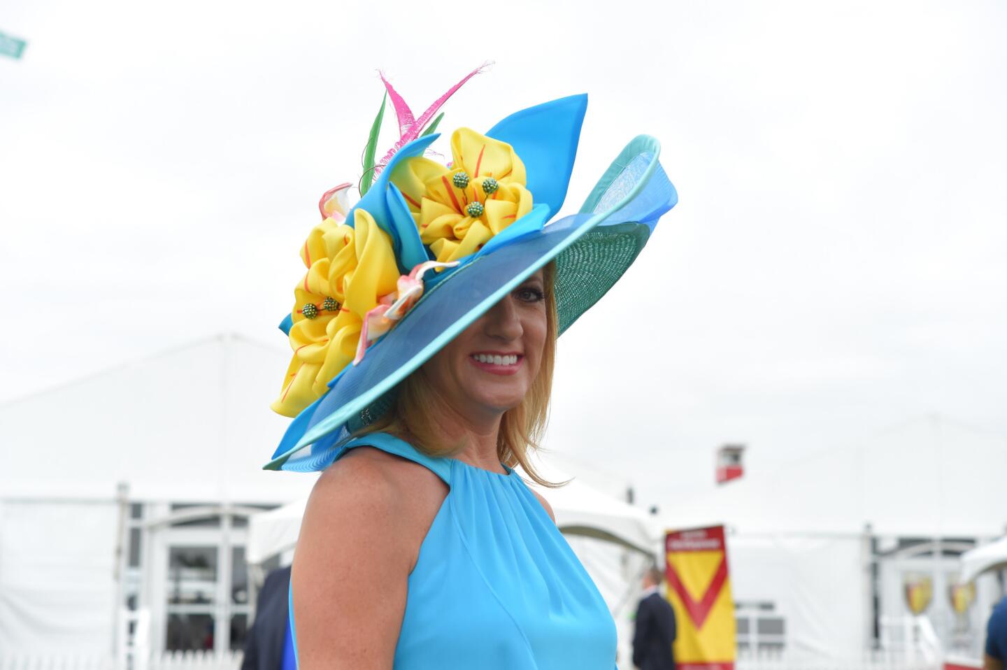 A blue and yellow look at the Preakness village.